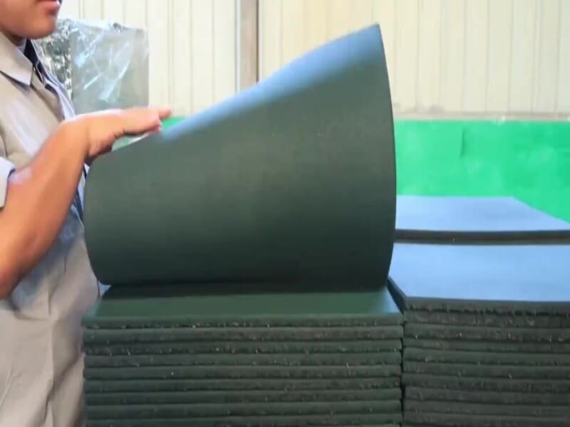 Testing rubber mat resilience